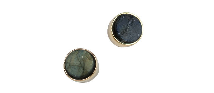 a pair of gold studs with black stone, by Ten Thousand Villages