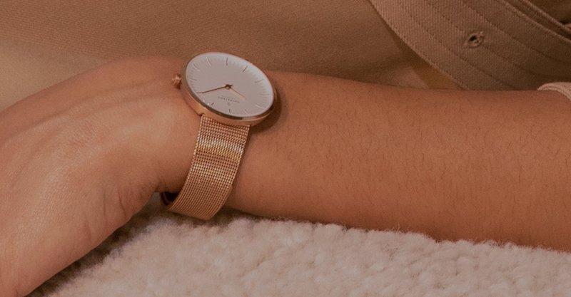 Left wrist of a woman wearing a Nordgreen watch