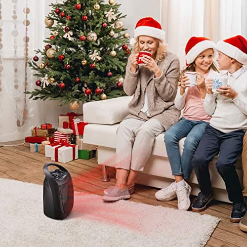 family sitting at Christmas in front of the most energy efficient heater
