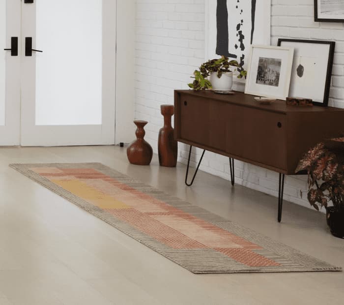 Burrow sustainable rug in hallway