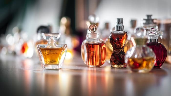 perfume bottles in different shapes and brands