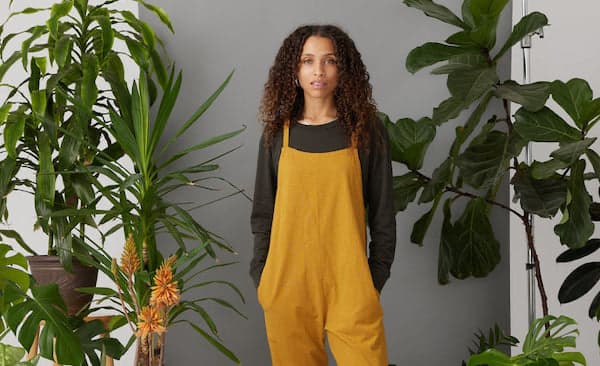 woman wearing black full sleeved tee and brown jumpsuit - all organic cotton clothing