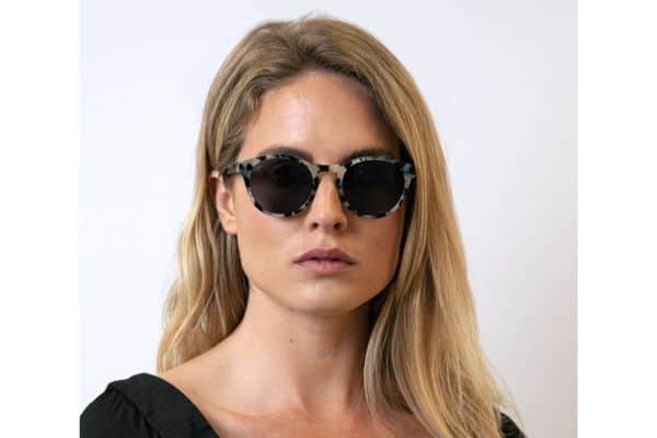 Blonde woman wearing Bird sunglasses