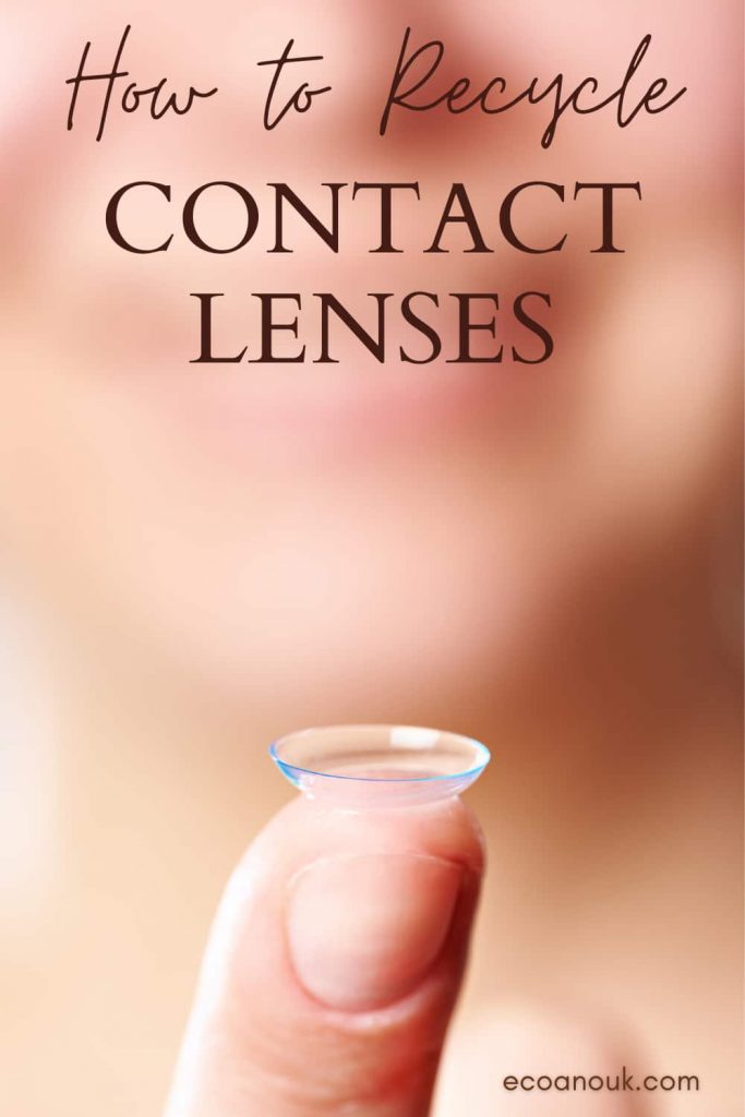close-up of woman holding up a contact lens with her right index finger
