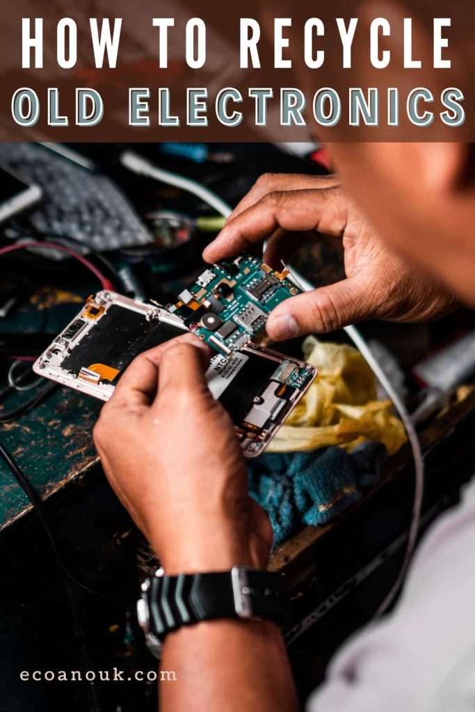 a repair man working on the electronic circuitry of a smartphone