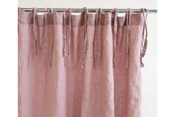 Close-up of Etsy's organic, sustainably made shower curtain in light pink