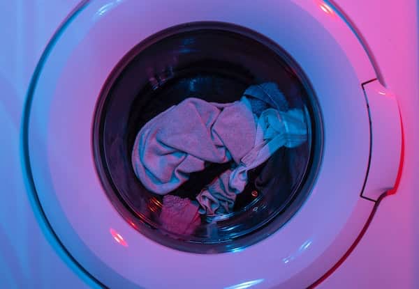 view of the door of a washing machine during a spin cycle