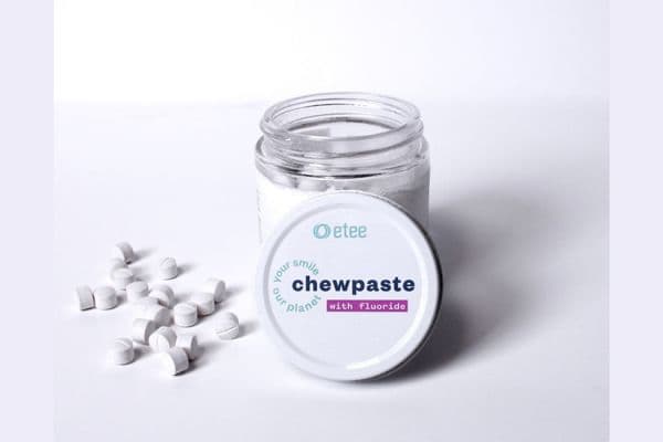 a tub of etee chew paste tablets
