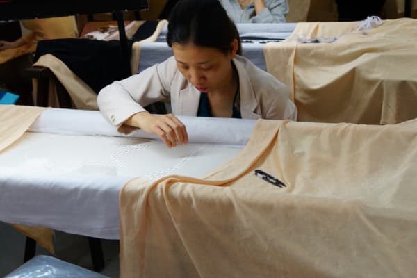 woman making silk in a silk factory